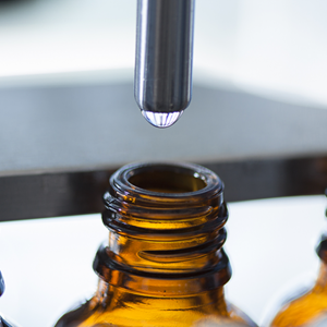 Medicinal canibis is poured into bottles by a machine