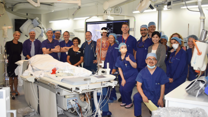 Group image of CEO, doctors and TAVI team.