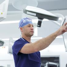 An endocrine surgeon prepares for surgery