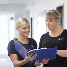 Nurses review a diet list