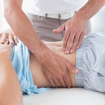 A patient recieves a throat ultrasound