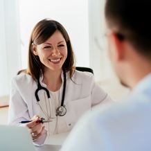Speech pathologist consults a patient