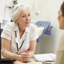 A psychologist consults with a patient