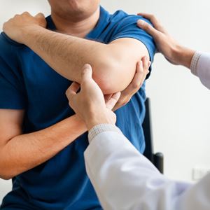 Patient seeing Doctor about elbow
