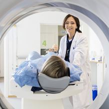 A patient is moved into an MRI machine