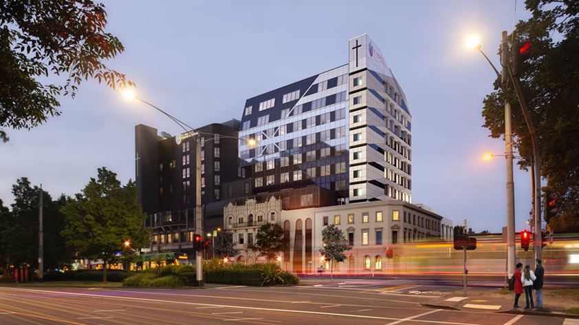 Image: Artist impression of the new 12-storey tower from Victoria Parade, Fitzroy.