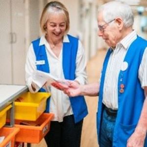 Volunteers at St Vincent's Private Hospital Northside with the art trolley
